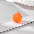 Macro detail of lifelike resin orange pendant showing citrus texture and silver loop - Orange AB Color Orange / F451-95
