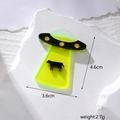 Macro detail of UFO cow abduction acrylic charm showing 4.6cm height and weight specs - A Cow Abduction Spaceship