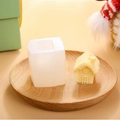 3D house silicone cake mold in translucent white with a small yellow castle pastry - No. 4 (54g)