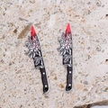 Detailed macro view of acrylic bloody knife pendants with floral patterns and blood splatters - Bouquet Shape (4 Flowers)