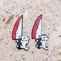 Macro shot of acrylic bloody cartoon cat pendants for DIY Halloween jewelry making - Puppy Design (10 Puppies)