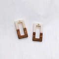 Detail of square hollow pendant made of cream resin and dark wood grain for jewelry DIY - White Hollow Rectangular