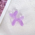 Translucent purple resin balloon dog charm with silver metal ring on white background - Purple