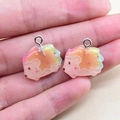 Detail of hedgehog resin charms with pink gradient and sparkling star sequins - Hedgehog