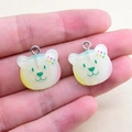 Detail of cute bear resin charms with star ears and colorful gradient effect on hand - Big Bear