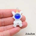Detailed view of the 3.6x2cm cartoon astronaut resin charm for DIY jewelry making - Golden Horn Starry Rabbit
