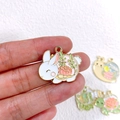 Detail of white enamel rabbit pendant with pink flowers for DIY jewelry making - Flower Rabbit