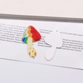 Macro detail of acrylic mushroom pendants with rainbow stripes for DIY jewelry making - Rainbow Mushroom