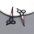 Pair of novelty black scissor charms with bloody splatter effect for Halloween jewelry - Scissors