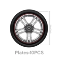 Close-up of 7-inch tire-shaped paper plates with silver wheel hub design for car themed parties - 7 Inch Wheel Plate