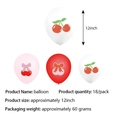 Detail of 12-inch cherry and bow print latex balloons in 18-piece party decoration set - Red Pink White Cherry Balloon Set