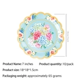 Detailansicht eines hellblauen 7-Zoll-Papptellers mit Blumenmuster und goldenem Wellenrand - Blau Gezackter 7 Zoll Papierteller
