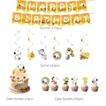Detail of Snoopy themed birthday banner with swirls and cake toppers for party decor - 4-Piece Decor Set: (Banner + Large Topper + Small Toppers + Swirls)