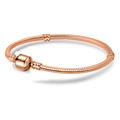 Elegant rose gold snake chain bracelet featuring a polished barrel clasp and threaded charms - 16cm / Rose Gold