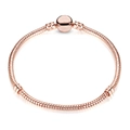 Elegant rose gold snake chain bracelet with classic round clasp on white background - 16cm / Rose Gold Round Head