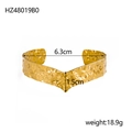 Irregular hammered open cuff bracelet in golden finish with V-shape design and 6.3cm diameter - Gold