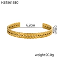 Detail shot of golden C-shaped open cuff with wheat texture, 0.8cm width and 6.2cm diameter - Wheat Braided Texture (HZ48615B0)