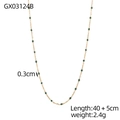 Dettaglio della collana a catena dorata con pietre verdi da 0,3cm, lunghezza 40+5cm - Stile catena sottile con piccole perline verdi (GX03124B)