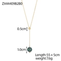 Detail of Y-shaped gold necklace featuring a zircon ring and a green bead pendant - Black Pearl Y-Shaped Zirconia Necklace (ZX44409B2B0)