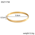 Detail view of golden bangle with Hakuna Matata engraving and 5.9cm diameter size - Gold Thick Engraved Style (DSZ1175B)