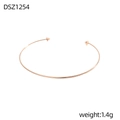 Minimalistischer roségoldener Armreif mit kleinen Pyramidennieten auf feinem Metallband - Roségold Ultradünner Spitzer Stil (DSZ1254)