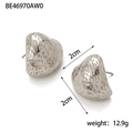Detailed view of silver heart earrings with textured finish, size 2cm and weight 12.9g - Silver Hammered Heart Stud Style (BE46970AW0)