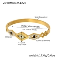 Detailed view of evil eye bangle with blue enamel and sparkling cubic zirconia stones - Evil Eye Style (Z070) / Gold