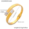 Detail view of gold stainless steel bangle with vertical ribbing and dual crystal settings - Vertical Ribbed Style (Z126-Gold Bracelet)