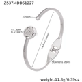 Bracciale rigido aperto in acciaio inox argento con fiore in zircone da 6,0 cm - Bracciale Color Acciaio (Z537)