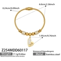 Macro detail of gold steel wire bracelet featuring heart pendant and size dimensions - Z254-Gold Bangle