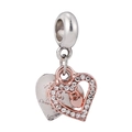 Detailed view of dual-heart charm with rose gold hollow heart and silver engraved back - Two-tone Heart Dangle (#10)