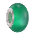Detailed view of a green faux cat-eye glass charm bead with a silver metal core center - Green