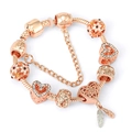 Rose gold snake chain bracelet featuring pink heart charms and double feather pendant - 16cm / Rose Gold Style 3