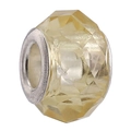 Macro detail of faceted amber crystal bead with silver core and gold foil flakes - Single Large Hole Faceted Bead / Yellow