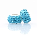 Macro shot of two light blue crystal pavé charms with large holes for DIY jewelry - Normal Specification / Lake Blue