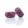 Macro detail of two purple clay beads with four rows of sparkling crystals and silver core - Normal Specification / Purple