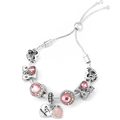 Detail of rose gold charm bracelet with 'MOM' lettering and pink crystal pendants - Pink MOM Rose Style (017)