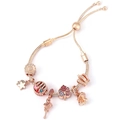 Detail of rose gold charm bracelet with flower, crown, and high heel pendants - Rose Gold High Heels Style (026)