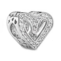 Close-up of heart-shaped silver charm with pave white zircon and side star cut-outs - Silver Pave Heart Hollow Bead (#13)