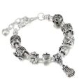 Detailed macro shot of silver lucky charm beads with S925 engraving on snake chain - Lucky Cat and Blessing Bag Style (手链#7)