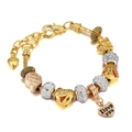 Detail of gold beaded bracelet with suitcase and I love you heart pendants - 16cm / White