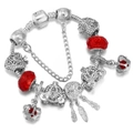 Close-up of silver charm bracelet with red crystal beads and dreamcatcher pendant - 16cm / Silver + Red Dreamcatcher