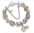 Silver snake chain bracelet featuring heart lock charms and yellow crystal beads - 17cm / Silver