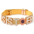 Golden mesh bracelet with rhinestone SISTER letters and a sunflower charm for women - SISTER / Gold