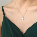 Elegant silver beaded necklace with oval white cat eye stone pendant on neck - Steel Color Large White (P704)