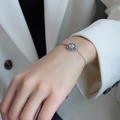Minimalist octagonal star zircon bracelet in silver finish on woman's wrist - Steel Color Bracelet 15+5cm (E259)