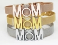 Detail of mesh bracelets in rose gold, gold, and silver with MOM charms and rhinestone ring - Mesh Bracelet / Gold