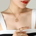 Elegant gold letter T pendant necklace featuring vibrant multi-color zircon stones - Letter T