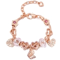 Detailed view of rose gold charm bracelet featuring pink rhinestone flowers and butterflies - Pink Rhinestone Flower Butterfly Style (#4) / 16cm