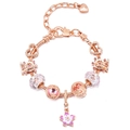 Close-up of rose gold charm bracelet featuring pink cherry blossoms and Ferris wheel charms - Ferris Wheel Heart Sakura Style (#12)